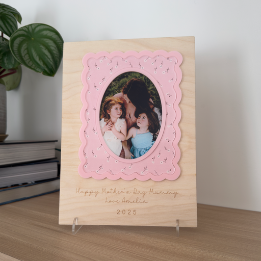wooden photo plaque with a wavy floral design