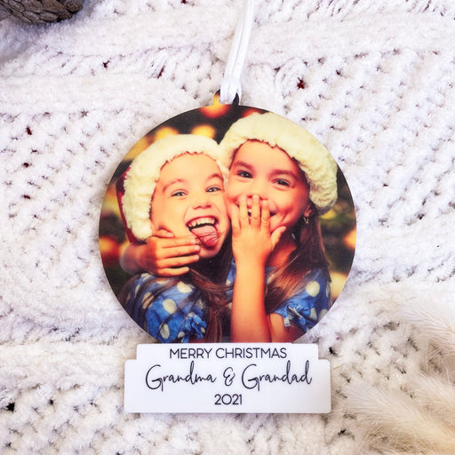 Christmas Tree Ornament with a photo of two young children wearing santa hats