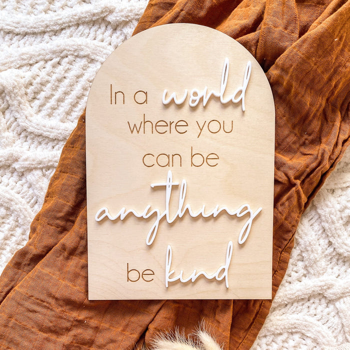 Kindness quote plaque on a linen bedspread