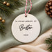 Back of the ceramic bauble reading In Loving Memory Of Buster 2026 in black lettering