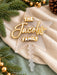 Star tree topper in frosted acrylic reading The Jacobs Family in white and gold mirror layers, with a stick at the base