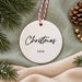 Back of the ceramic bauble reading Christmas 2026 in black script